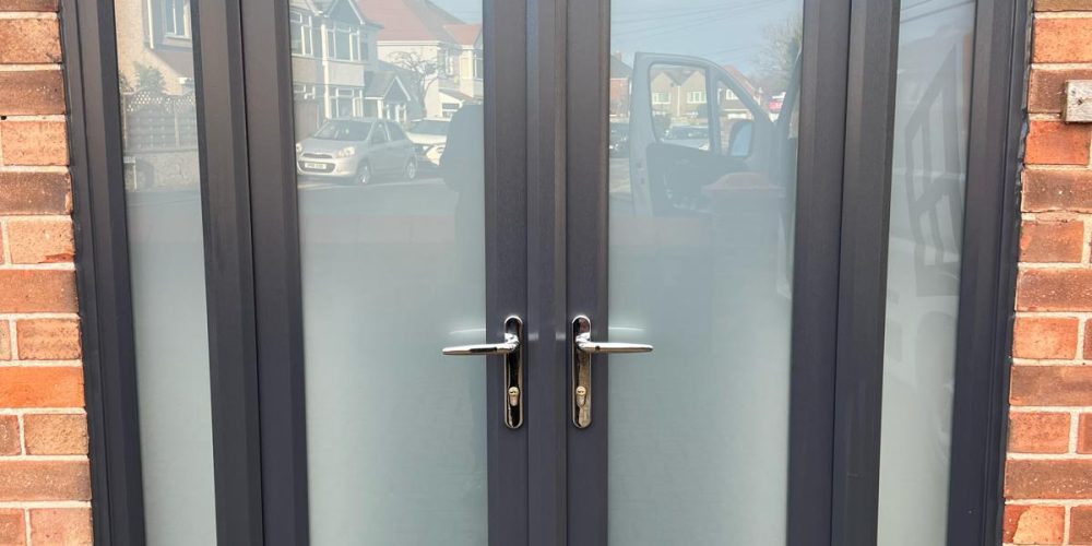 Anthracite UPVC French Door with satin glass in Rhyl North Wales